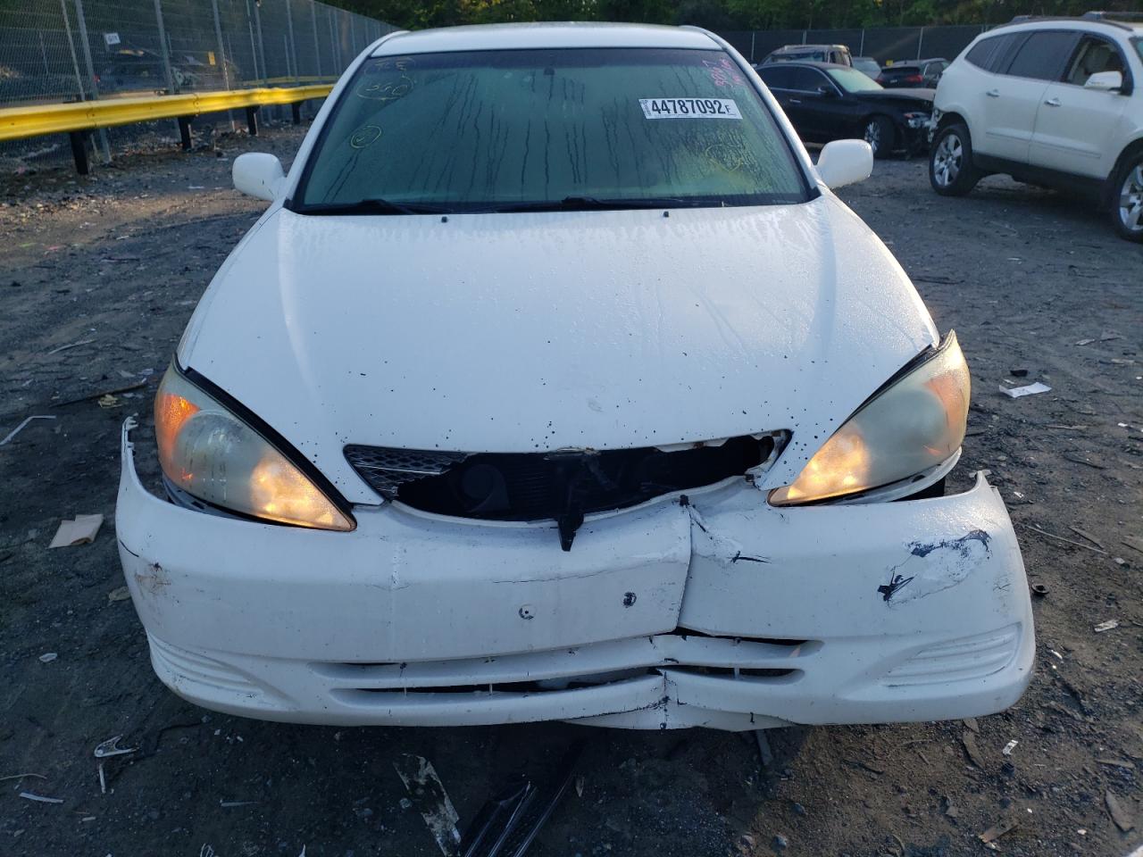 Photo 9 from auction – 2002 TOYOTA CAMRY LE with VIN 4T1BF32K72U025122
