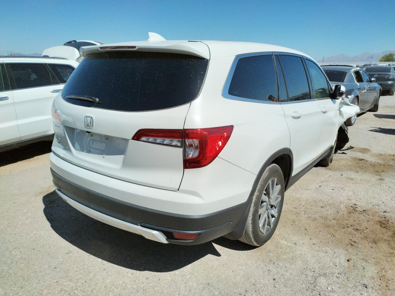 Photo 4 from auction – 2021 HONDA PILOT EXL with VIN 5FNYF5H58MB012225