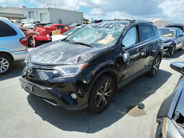 Photo 2 from auction – 2016 TOYOTA RAV4 XLE with VIN 2T3WFREV1GW239743