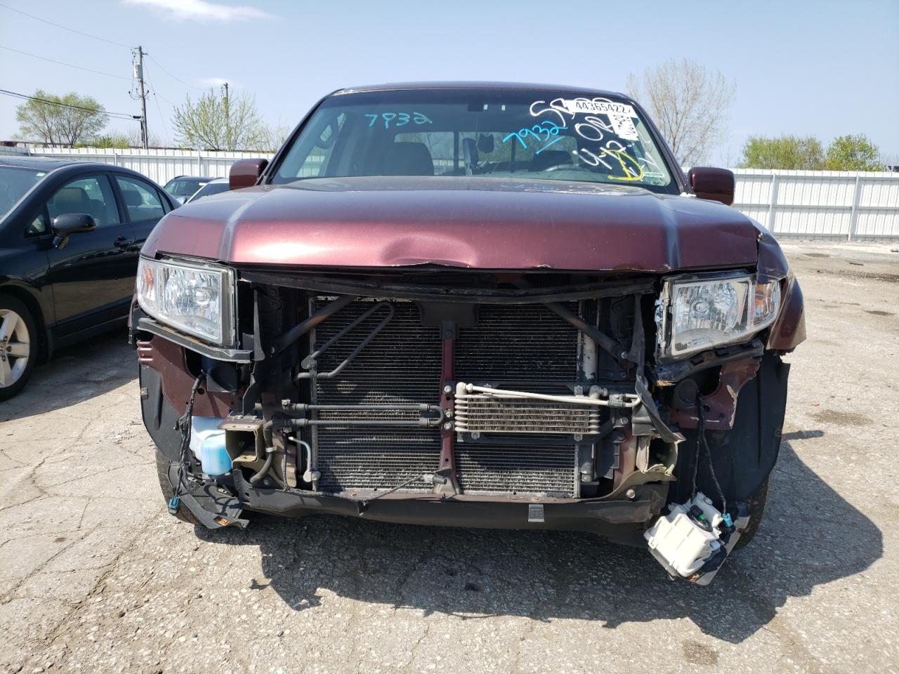 Photo 9 from auction – 2012 HONDA RIDGELINE with VIN 5FPYK1F54CB457932