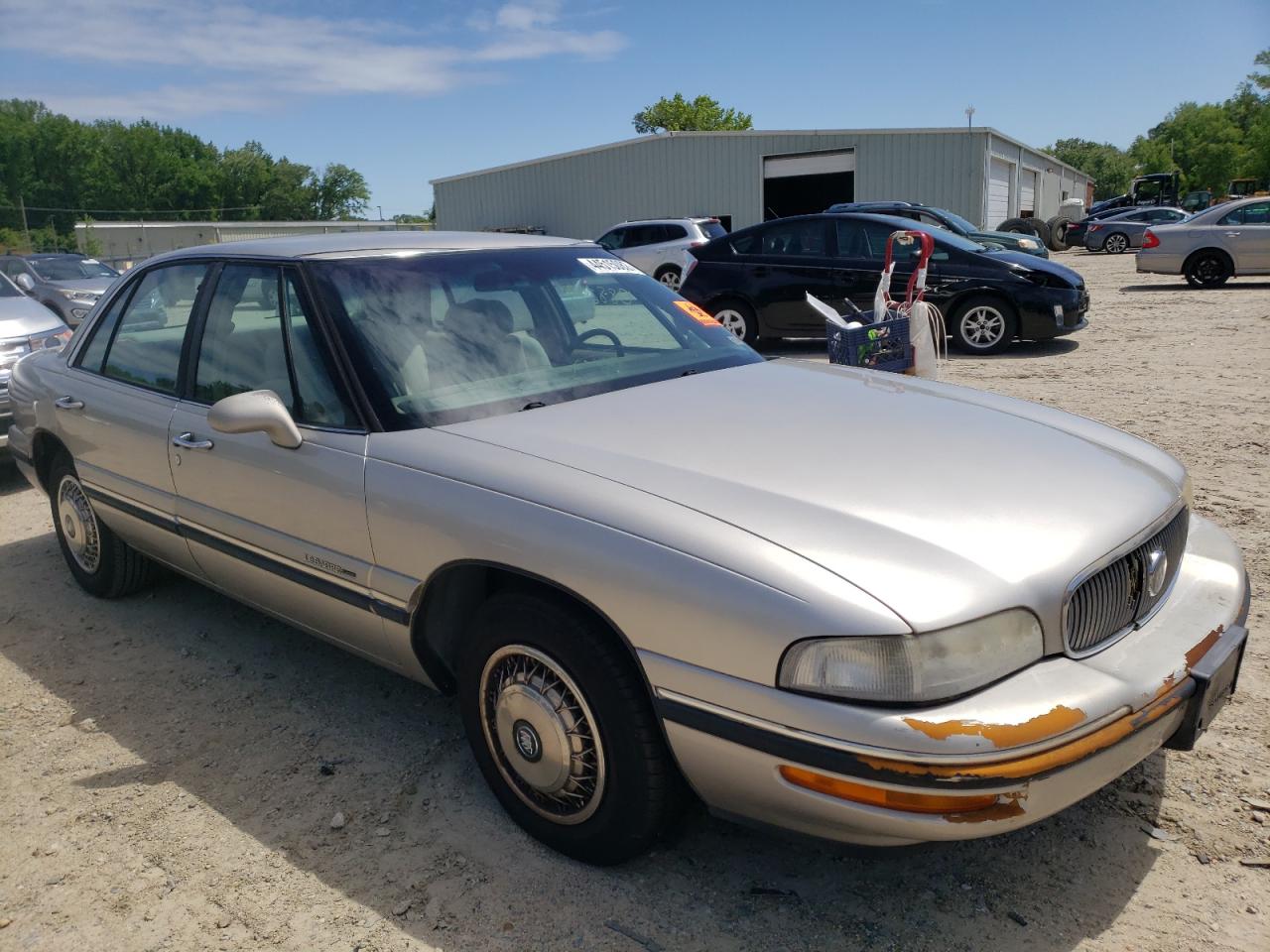 BUICK LESABRE CU 1997 with VIN 1G4HP52K4VH449034 - Photo from auction