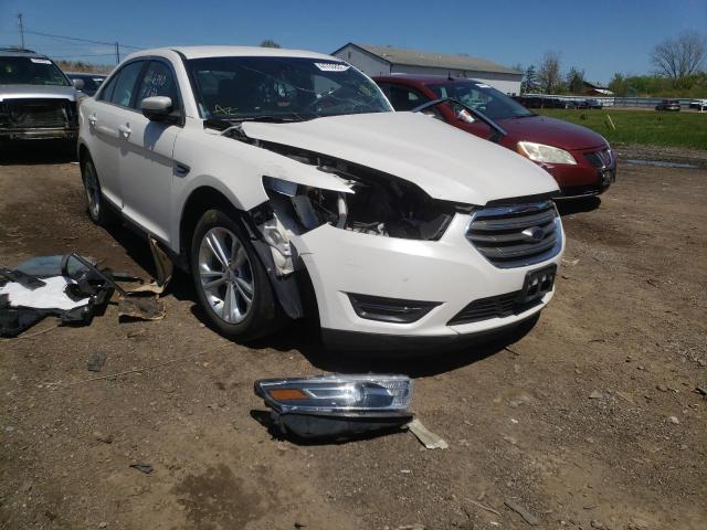 FORD TAURUS SEL 2018 with VIN 1FAHP2E88JG142183 - Photo from auction