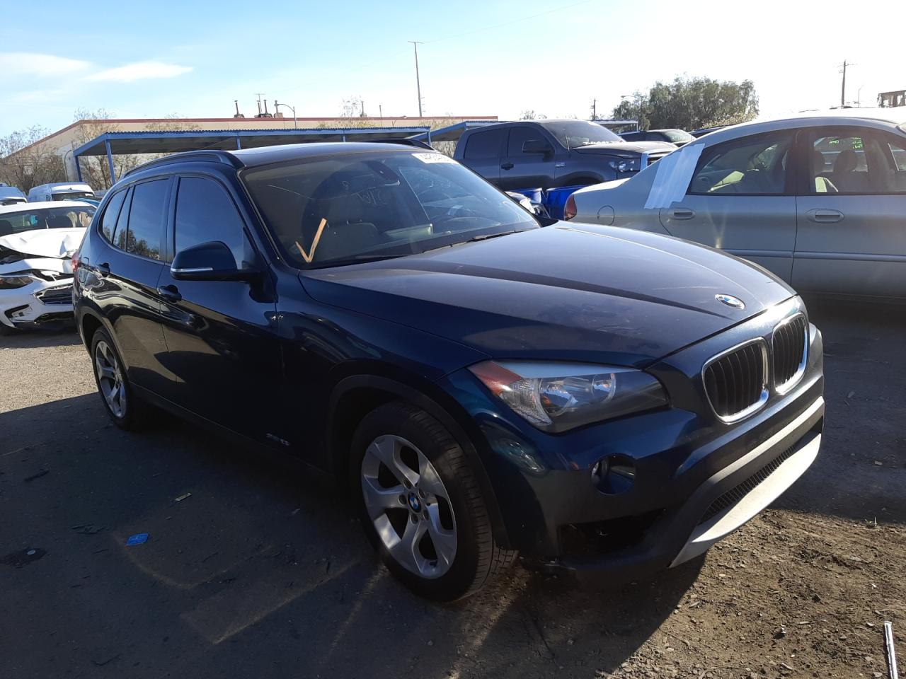 BMW X1 SDRIVE2 2014 with VIN WBAVM1C52EVW49989 - Photo from auction