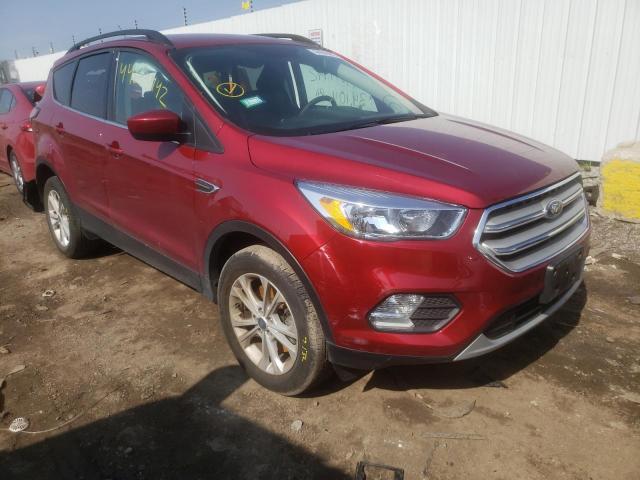 FORD ESCAPE SE 2018 with VIN 1FMCU9GD0JUC39651 - Photo from auction