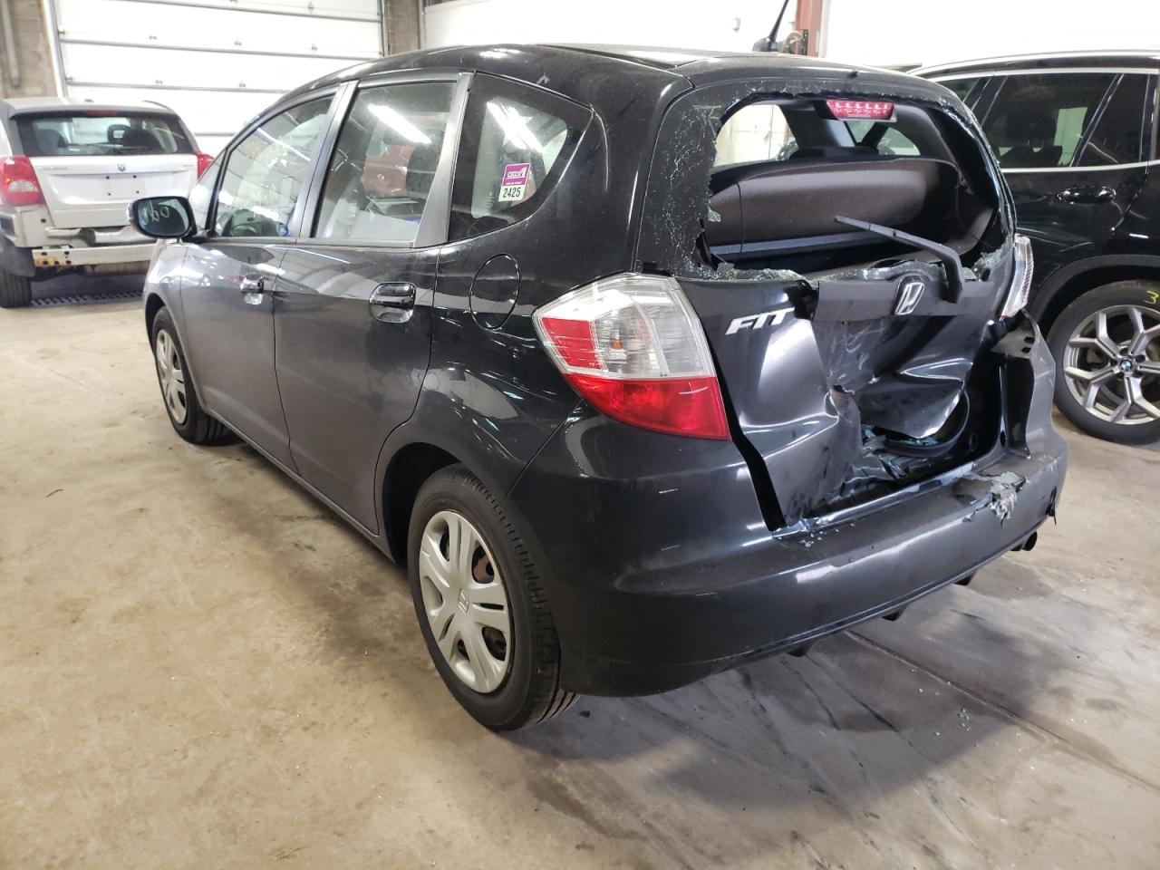 Photo 3 from auction – 2011 HONDA FIT with VIN JHMGE8H33BS011027