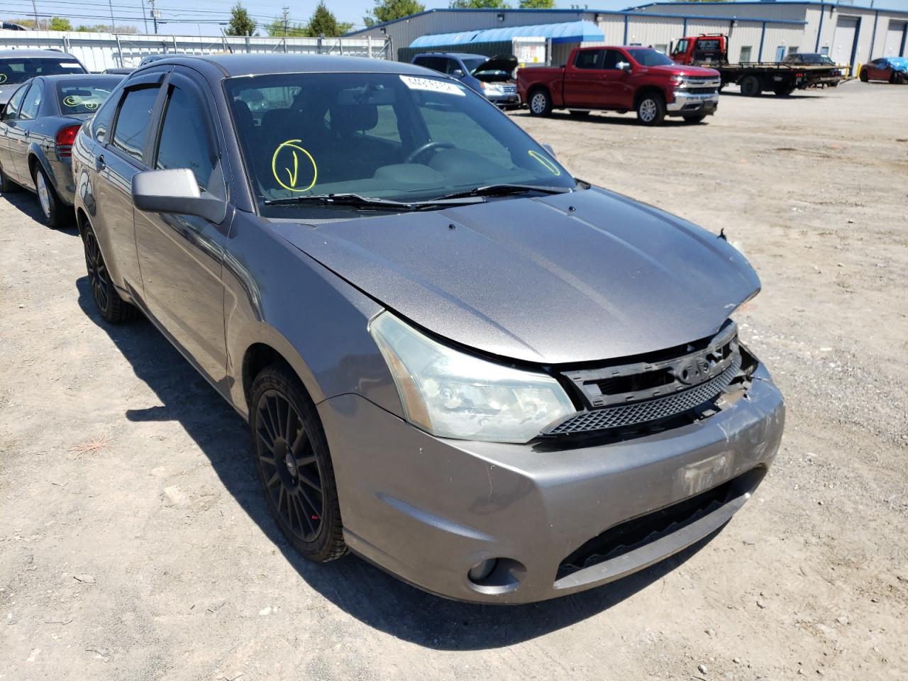FORD FOCUS SES 2010 with VIN 1FAHP3GNXAW167827 - Photo from auction