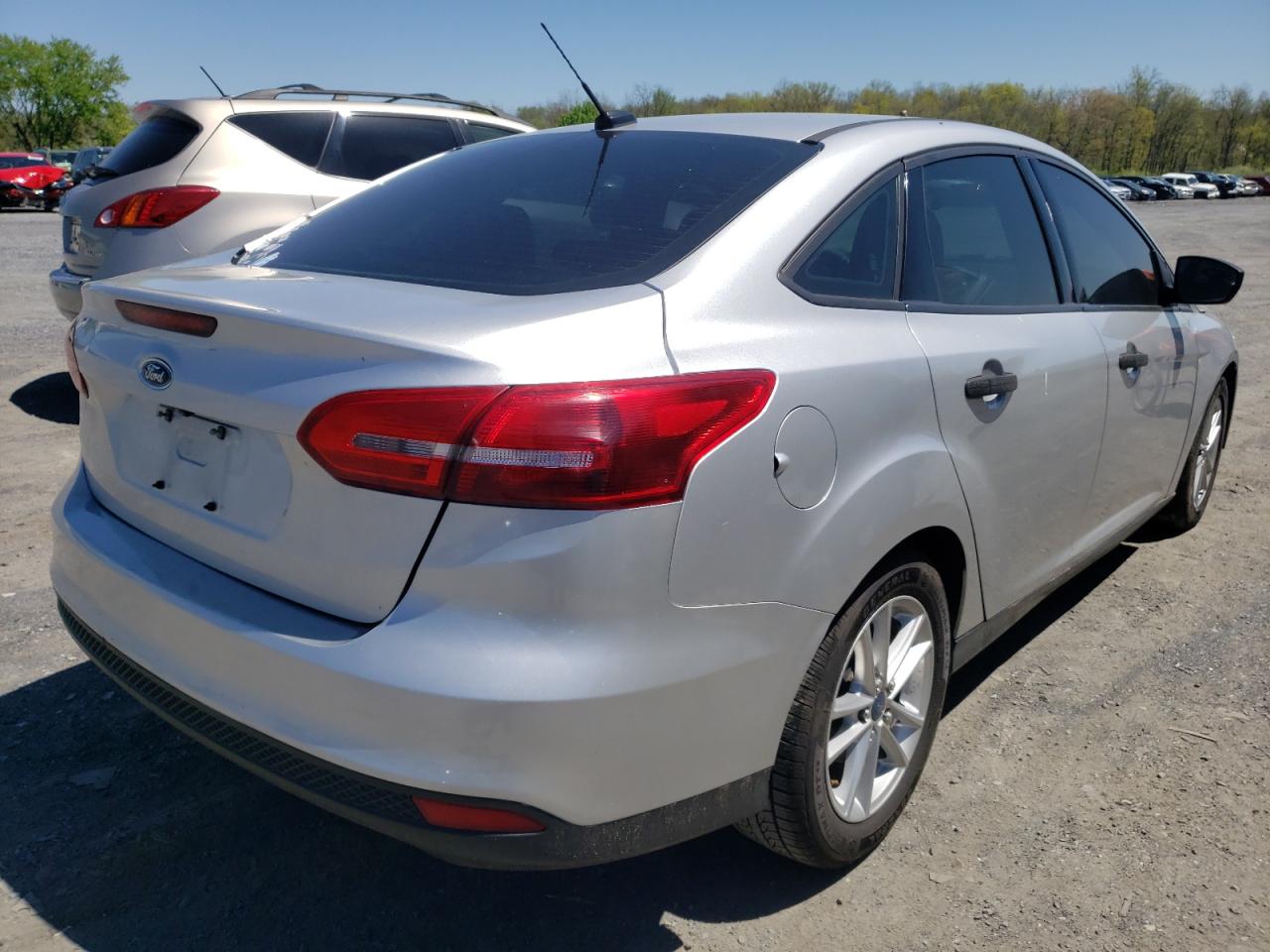 Photo 4 from auction – 2016 FORD FOCUS S with VIN 1FADP3E29GL386005