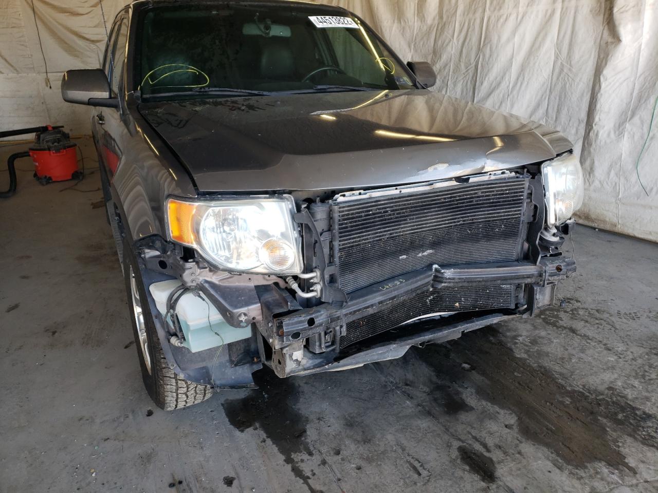 Photo 9 from auction – 2011 FORD ESCAPE LIM with VIN 1FMCU9EG7BKA78094