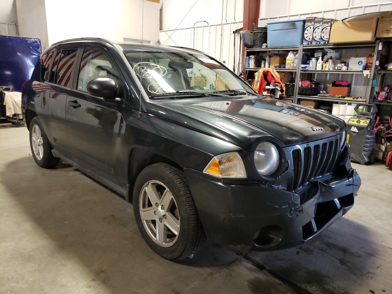 JEEP COMPASS 2007 with VIN 1J8FF47W87D129853 - Photo from auction