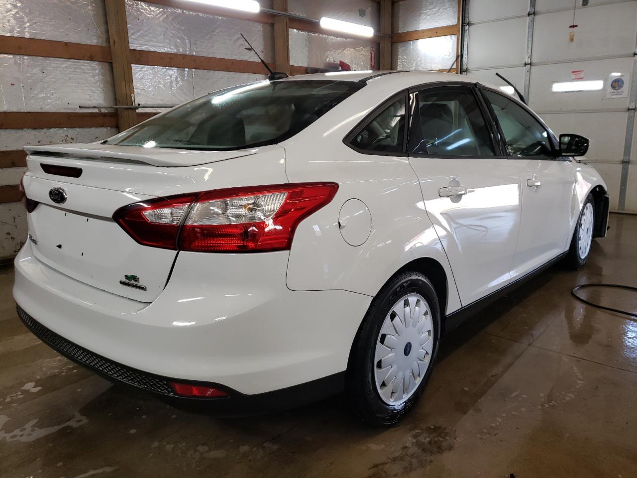 Photo 4 from auction – 2014 FORD FOCUS SE with VIN 1FADP3F22EL225166