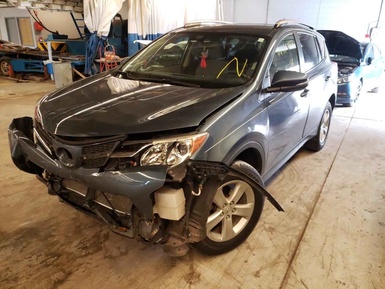 Photo 2 from auction – 2013 TOYOTA RAV4 XLE with VIN JTMRFREVXDD045427