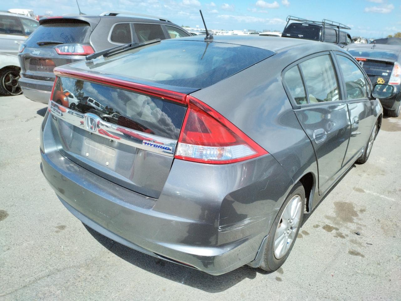 Photo 4 from auction – 2012 HONDA INSIGHT EX with VIN JHMZE2H78CS001376