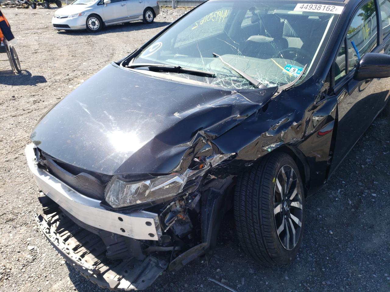 Photo 19 from auction – 2015 HONDA CIVIC EXL with VIN 19XFB2F90FE240669