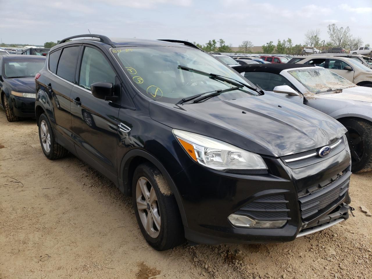 FORD ESCAPE SE 2014 with VIN 1FMCU0GX3EUC69853 - Photo from auction