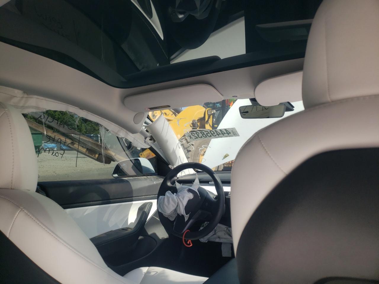 Photo 9 from auction – 2021 TESLA MODEL 3 with VIN 5YJ3E1EA7MF853699