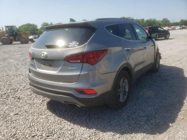 Photo 4 from auction – 2018 HYUNDAI SANTA FE S with VIN 5NMZU3LB2JH105585