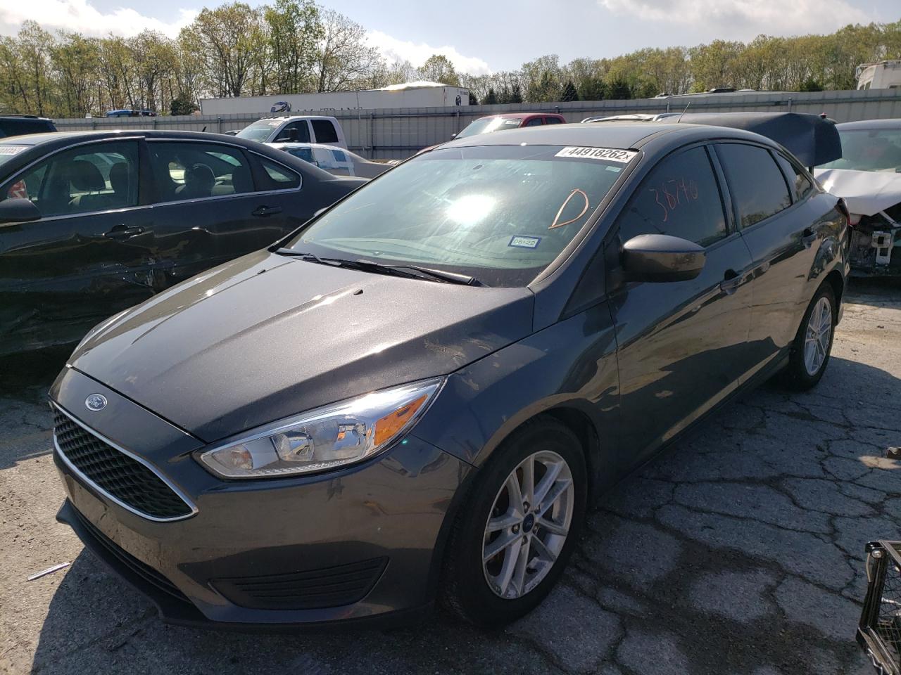 Photo 15 from auction – 2018 FORD FOCUS SE with VIN 1FADP3F21JL302359