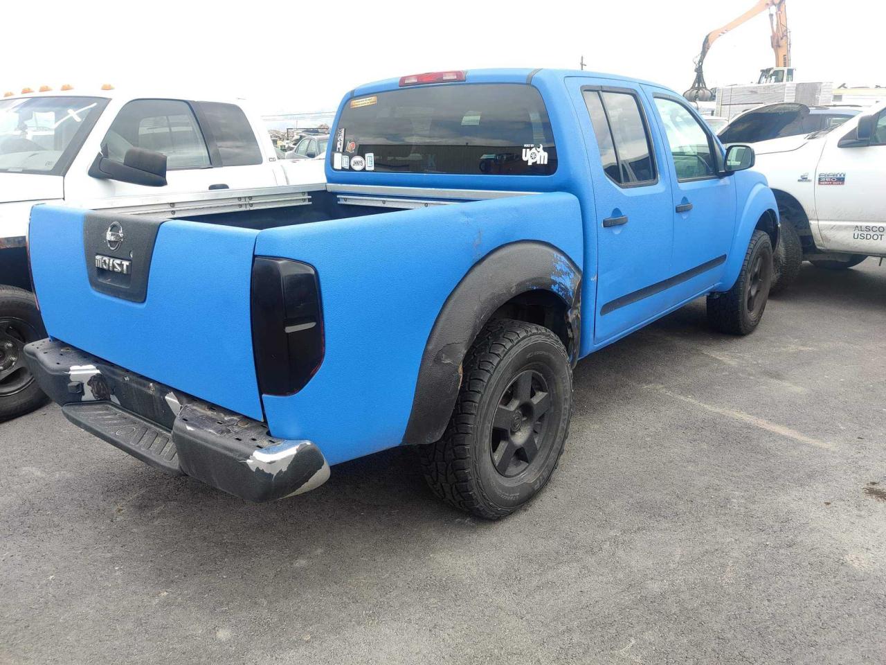 Photo 4 from auction – 2005 NISSAN FRONTIER C with VIN 1N6AD07W85C410633