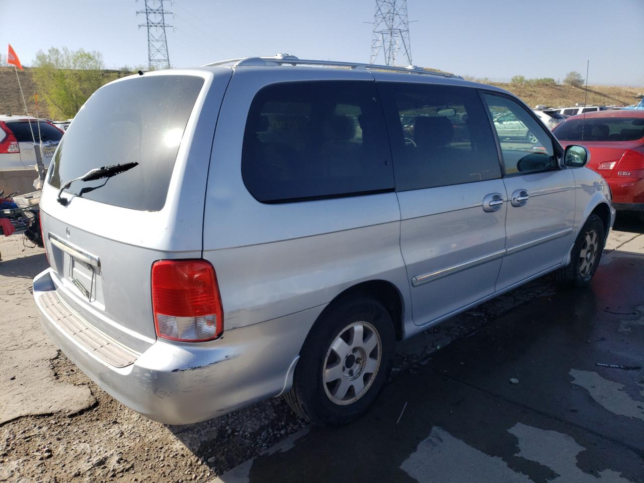 Photo 4 from auction – 2002 KIA SEDONA EX with VIN KNDUP131X26285555