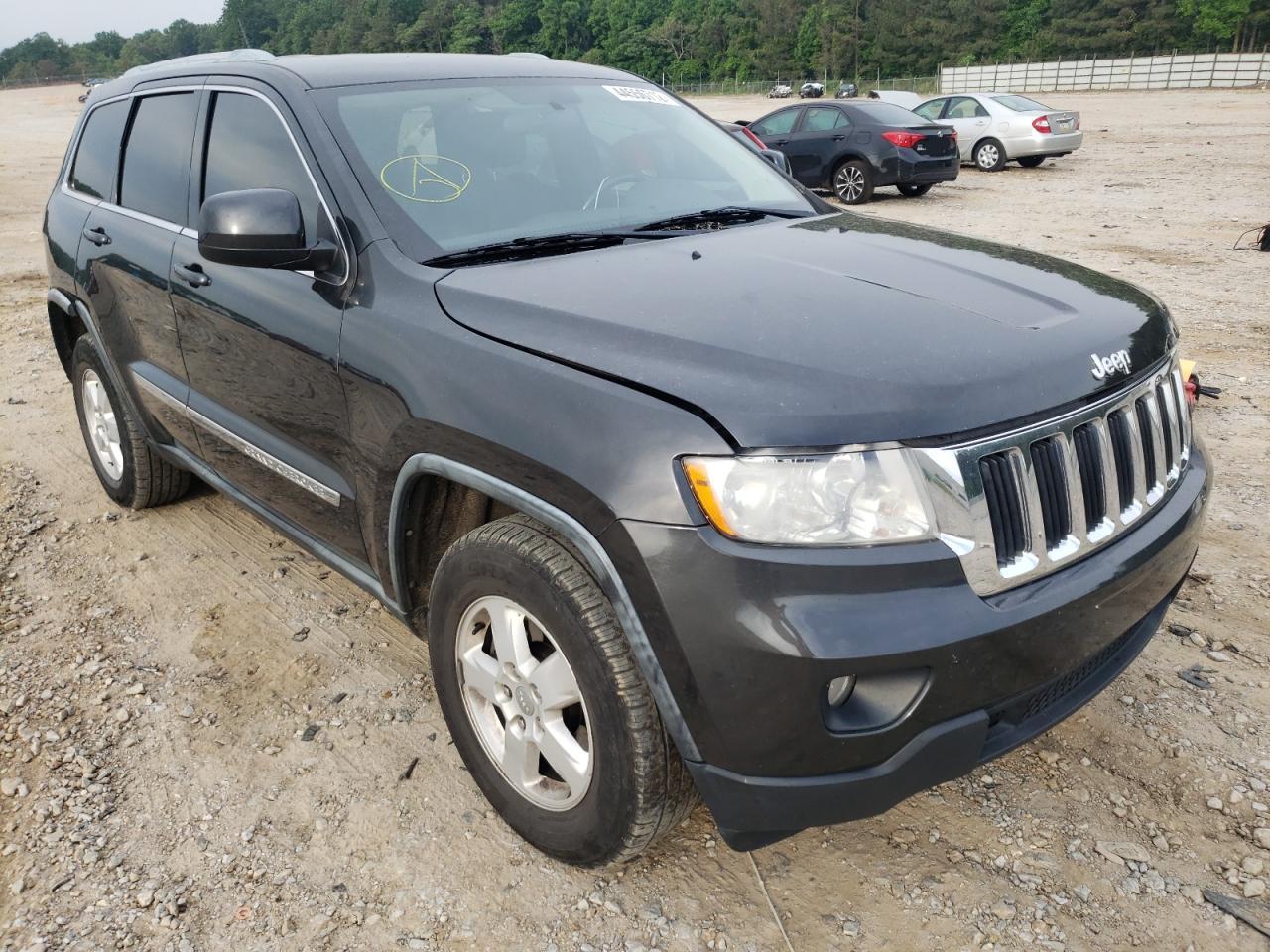 JEEP GRAND CHER 2011 with VIN 1J4RR4GG6BC584598 - Photo from auction