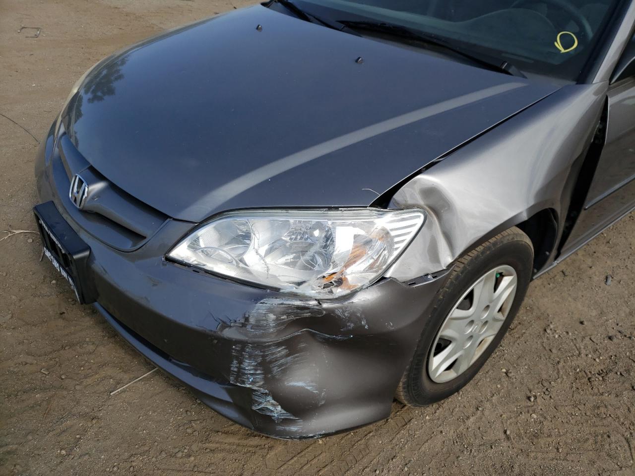 Photo 9 from auction – 2005 HONDA CIVIC DX V with VIN 2HGES16355H570944