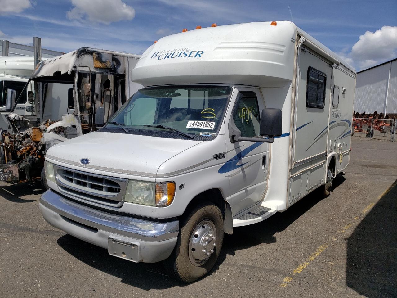 Photo 2 from auction – 2003 FORD MH with VIN 1FDWE35S62HB69687