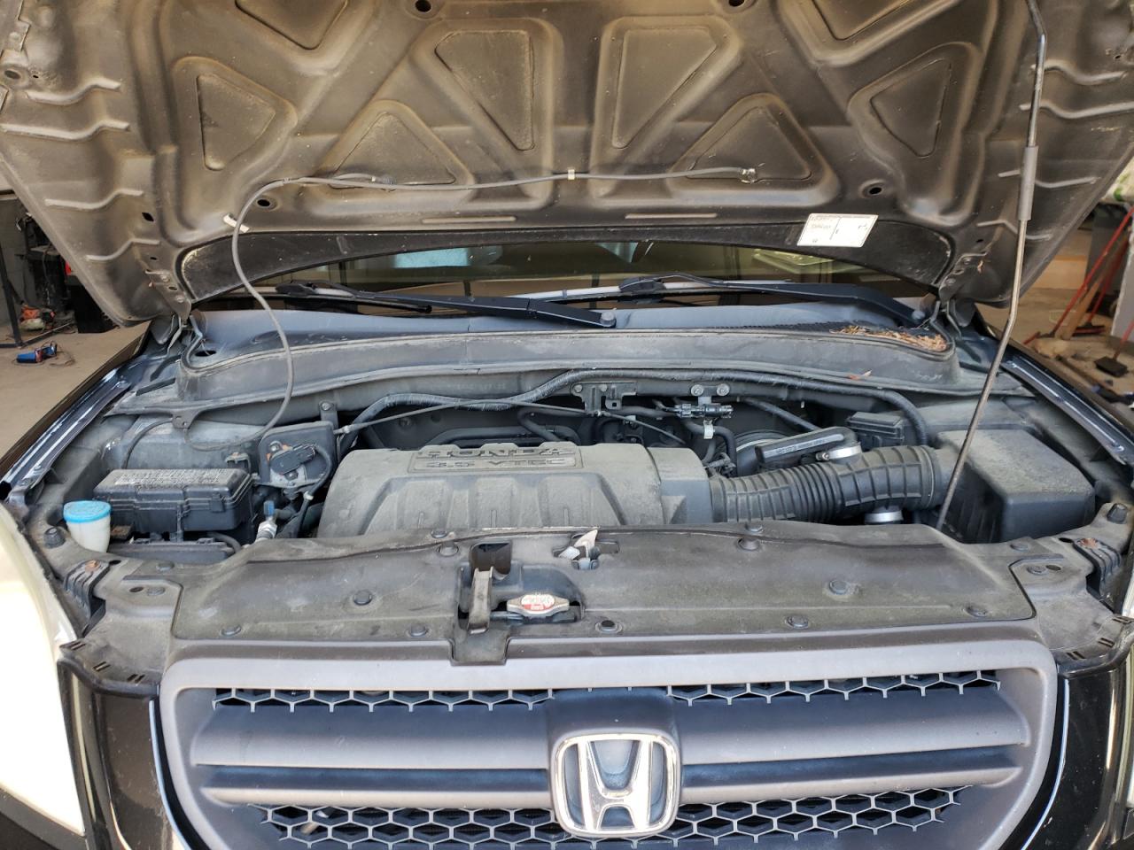 Photo 7 from auction – 2005 HONDA PILOT with VIN 2HKYF18645H536122
