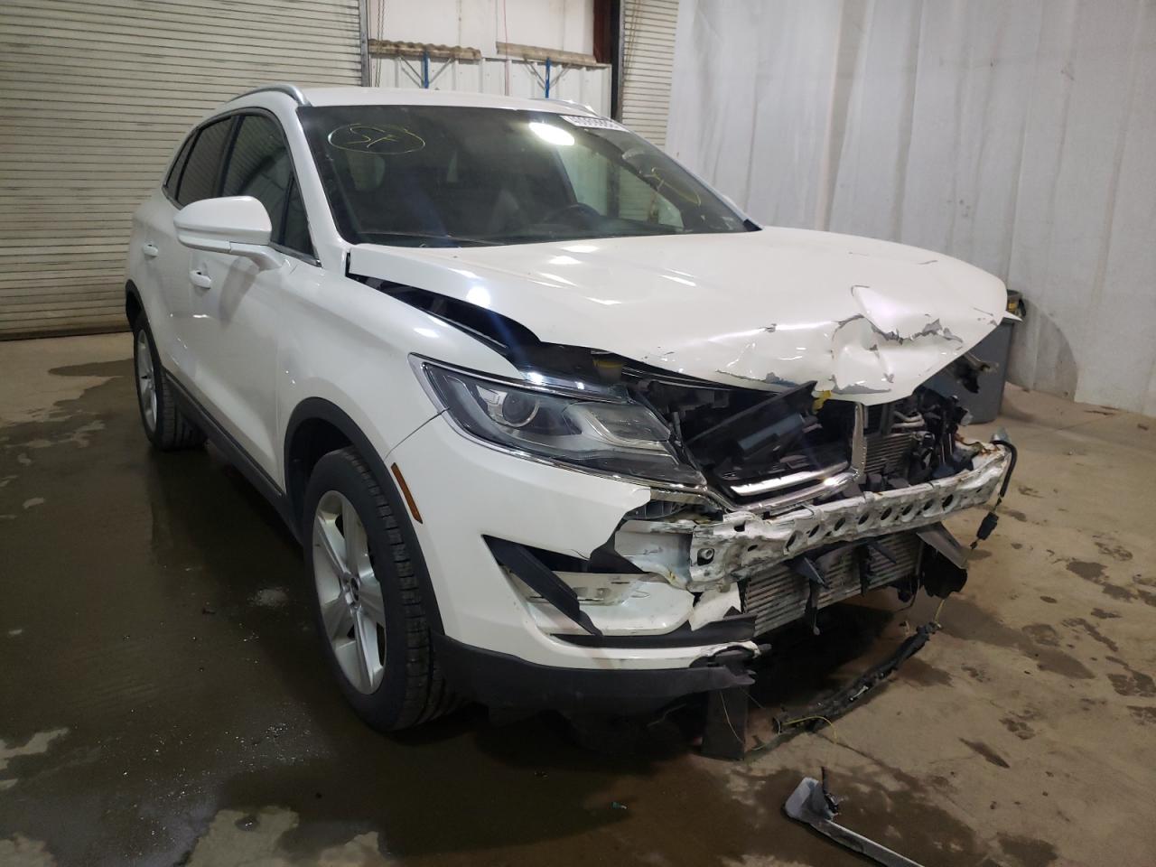 LINCOLN MKC 2015 with VIN 5LMCJ2A98FUJ24496 - Photo from auction