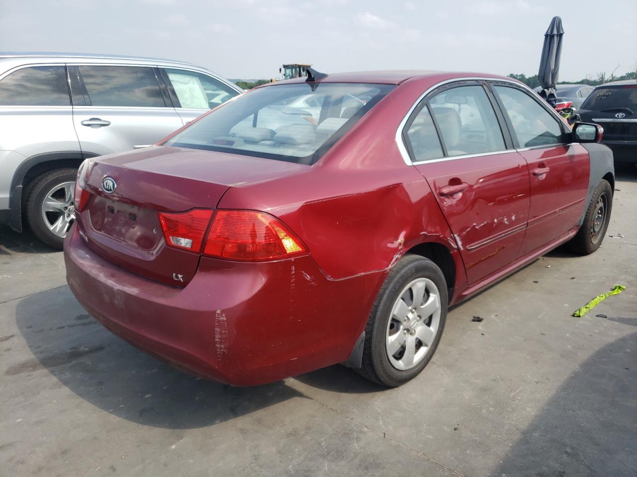 Photo 4 from auction – 2009 KIA OPTIMA LX with VIN KNAGE228295322571