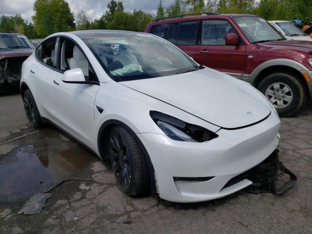 TESLA MODEL Y 2022 with VIN 7SAYGDEF0NF359492 - Photo from auction