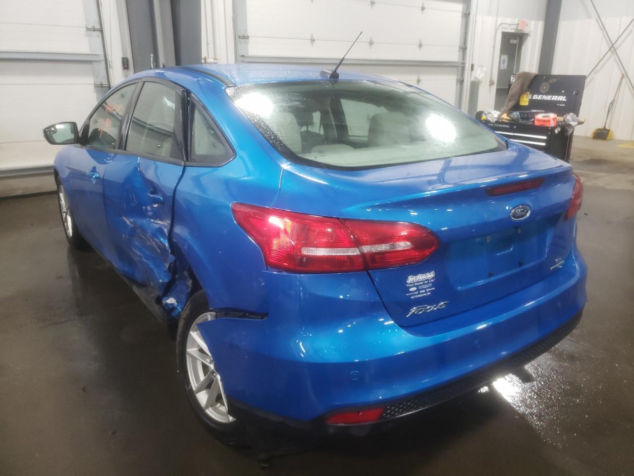 Photo 3 from auction – 2016 FORD FOCUS SE with VIN 1FADP3F25GL282223