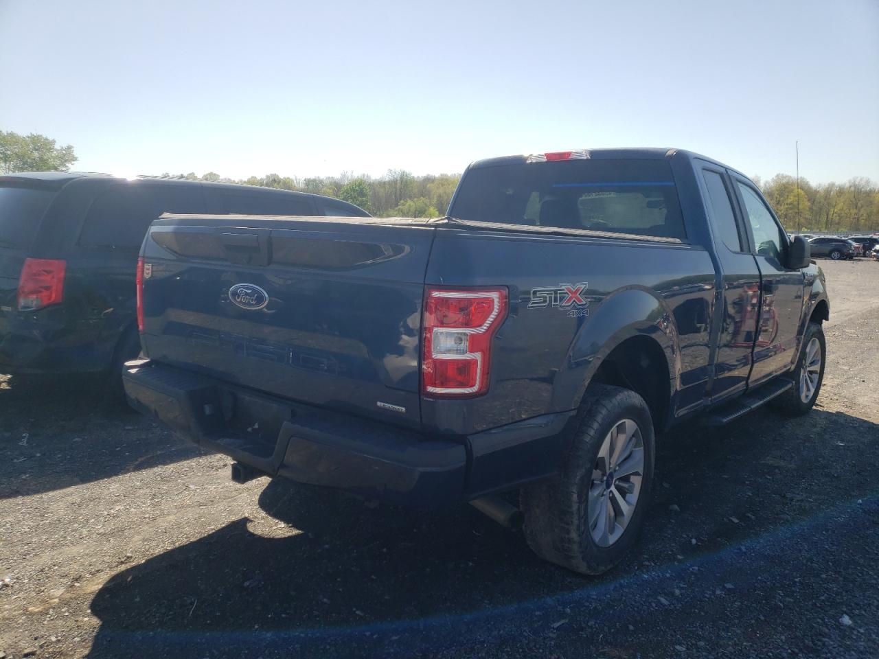 Photo 4 from auction – 2018 FORD F150 SUPER with VIN 1FTEX1EP1JFA54628