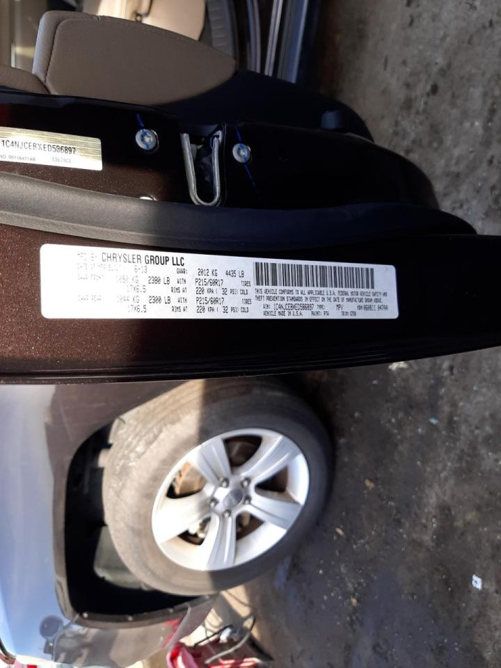 Photo 10 from auction – 2014 JEEP COMPASS LA with VIN 1C4NJCEBXED586897
