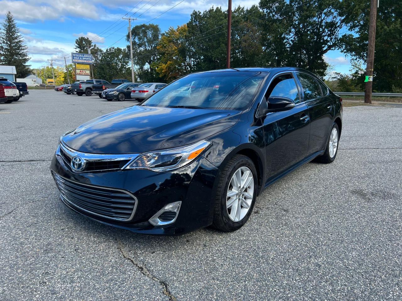 Photo 2 from auction – 2014 TOYOTA AVALON HYB with VIN 4T1BD1EB7EU029021