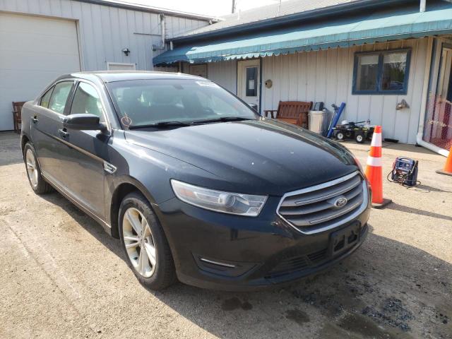 FORD TAURUS SEL 2014 with VIN 1FAHP2E84EG121126 - Photo from auction