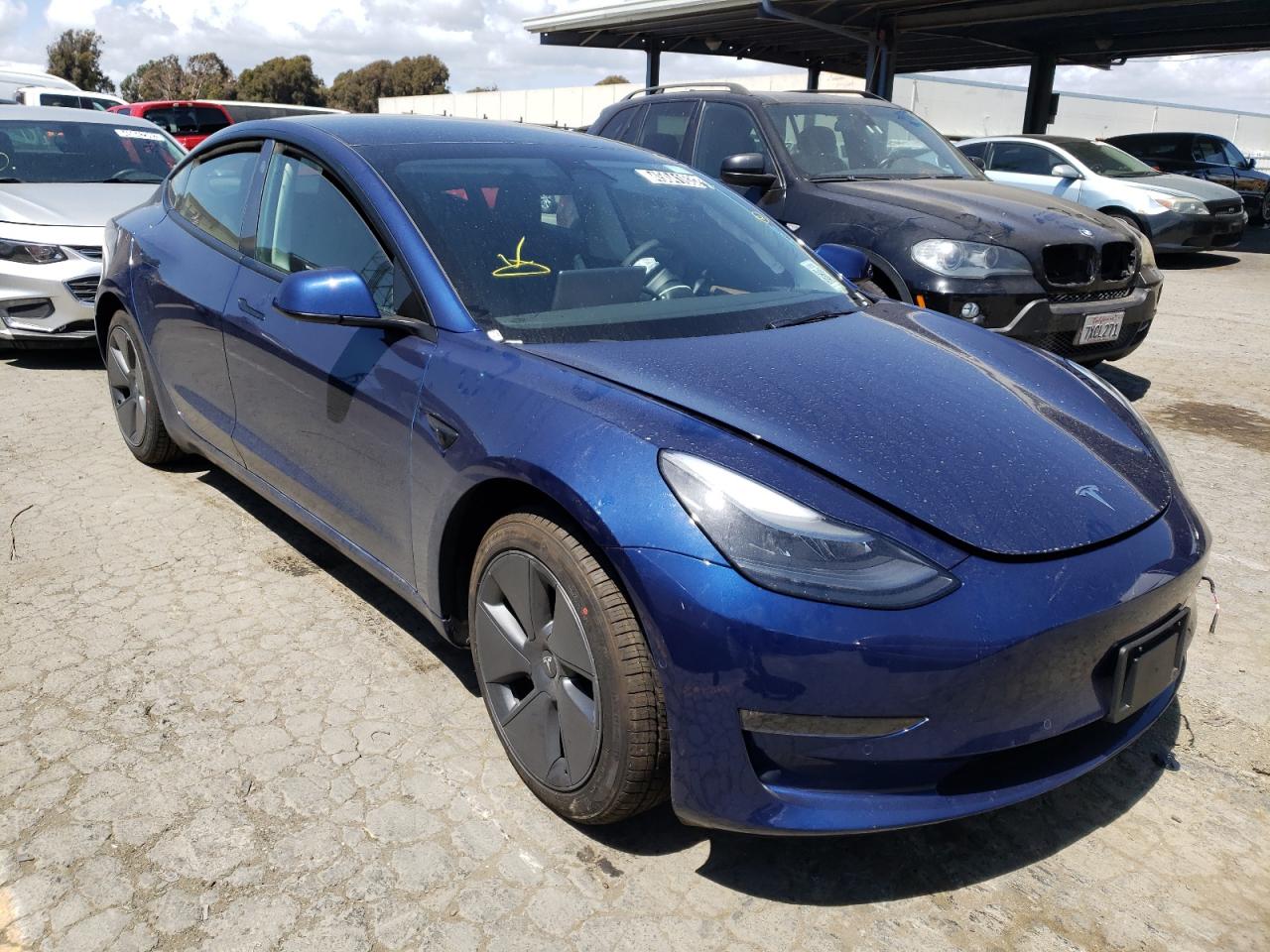 TESLA MODEL 3 2022 with VIN 5YJ3E1EB2NF189063 - Photo from auction