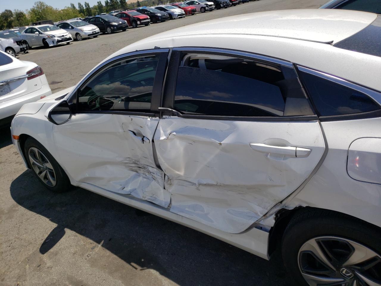 Photo 10 from auction – 2019 HONDA CIVIC LX with VIN 2HGFC2F61KH589388