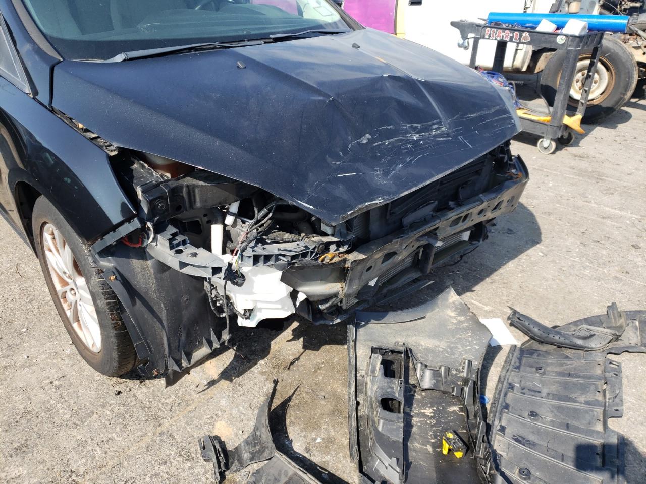 Photo 9 from auction – 2015 FORD FOCUS SE with VIN 1FADP3F2XFL226857