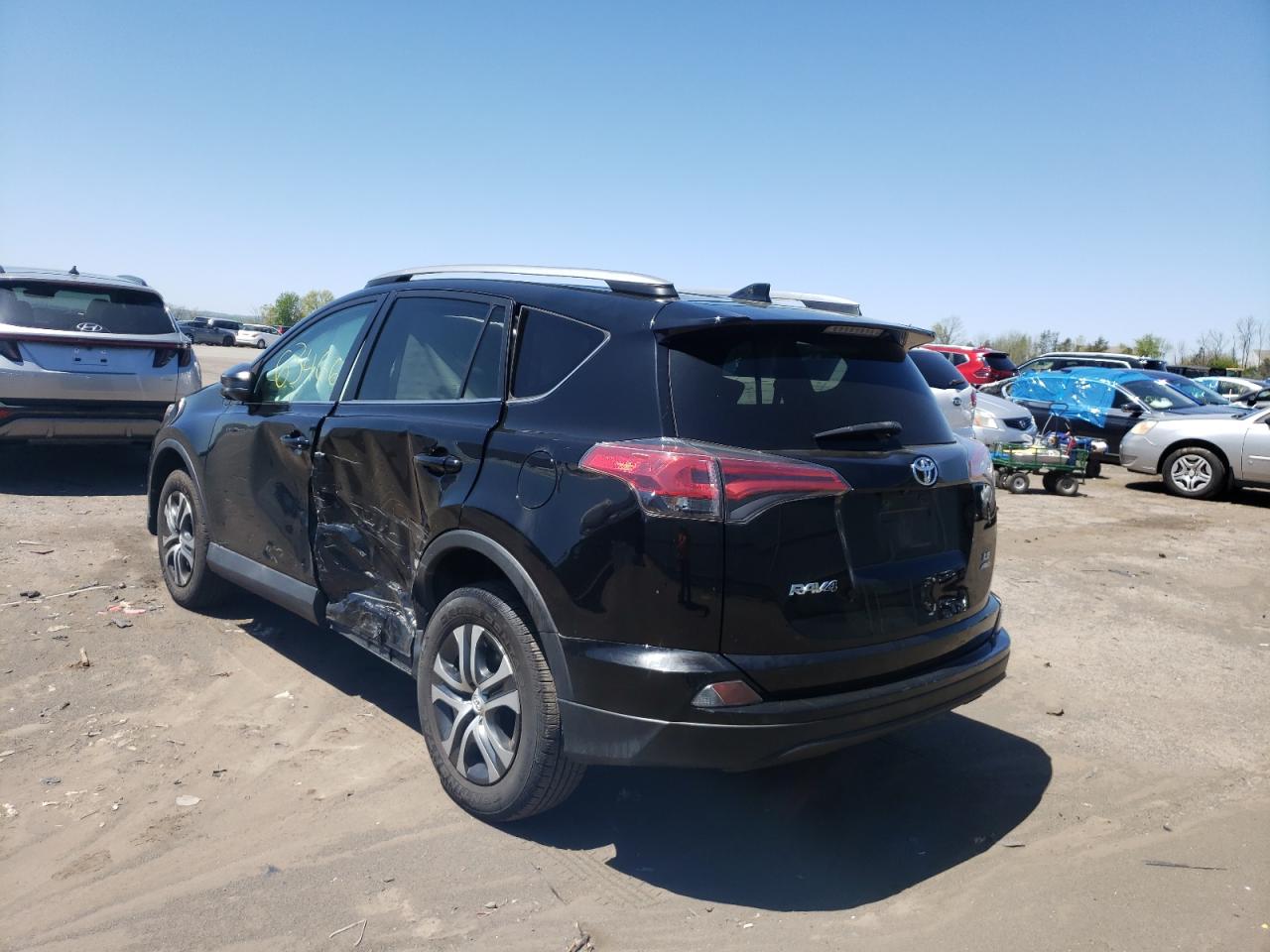 Photo 3 from auction – 2017 TOYOTA RAV4 LE with VIN 2T3BFREV7HW588261