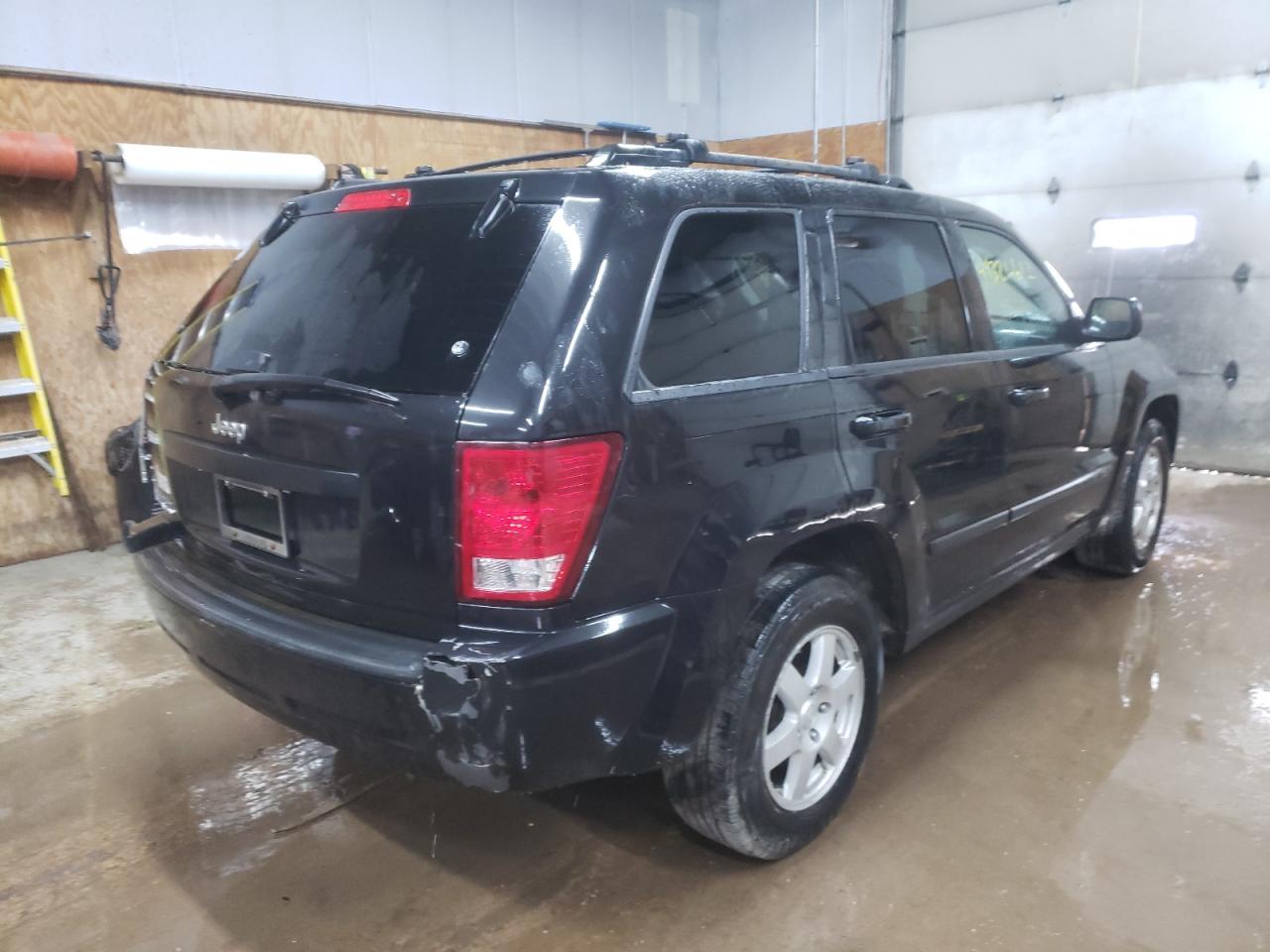 Photo 4 from auction – 2009 JEEP GRAND CHER with VIN 1J8GR48K19C533044