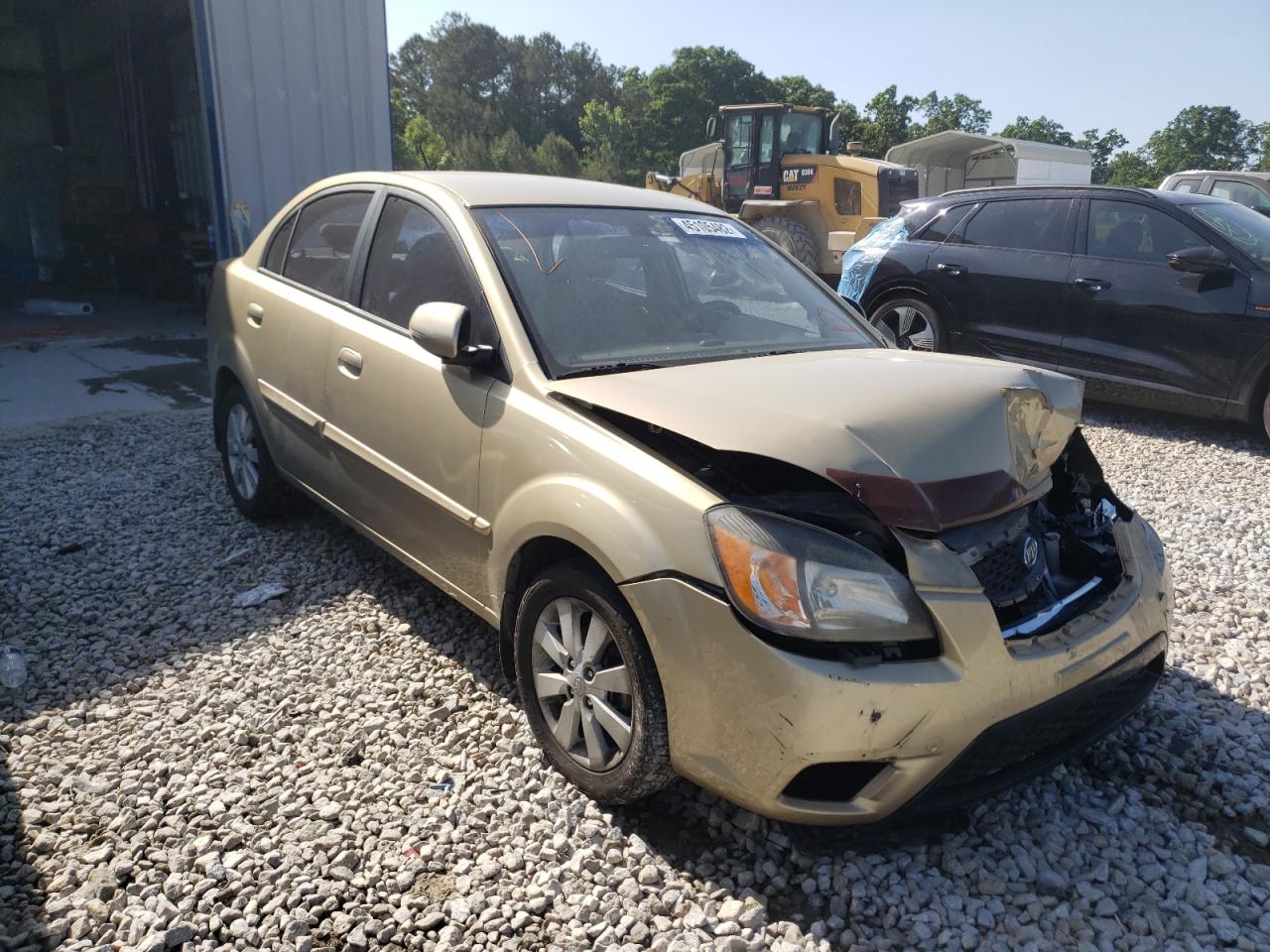 KIA RIO BASE 2011 with VIN KNADH4A31B6733990 - Photo from auction