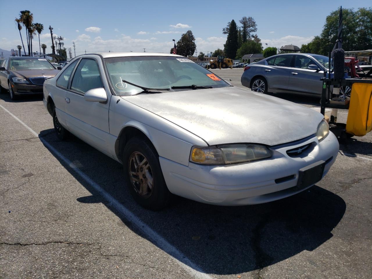 FORD THUNDERBIR 1997 with VIN 1FALP62W5VH117715 - Photo from auction