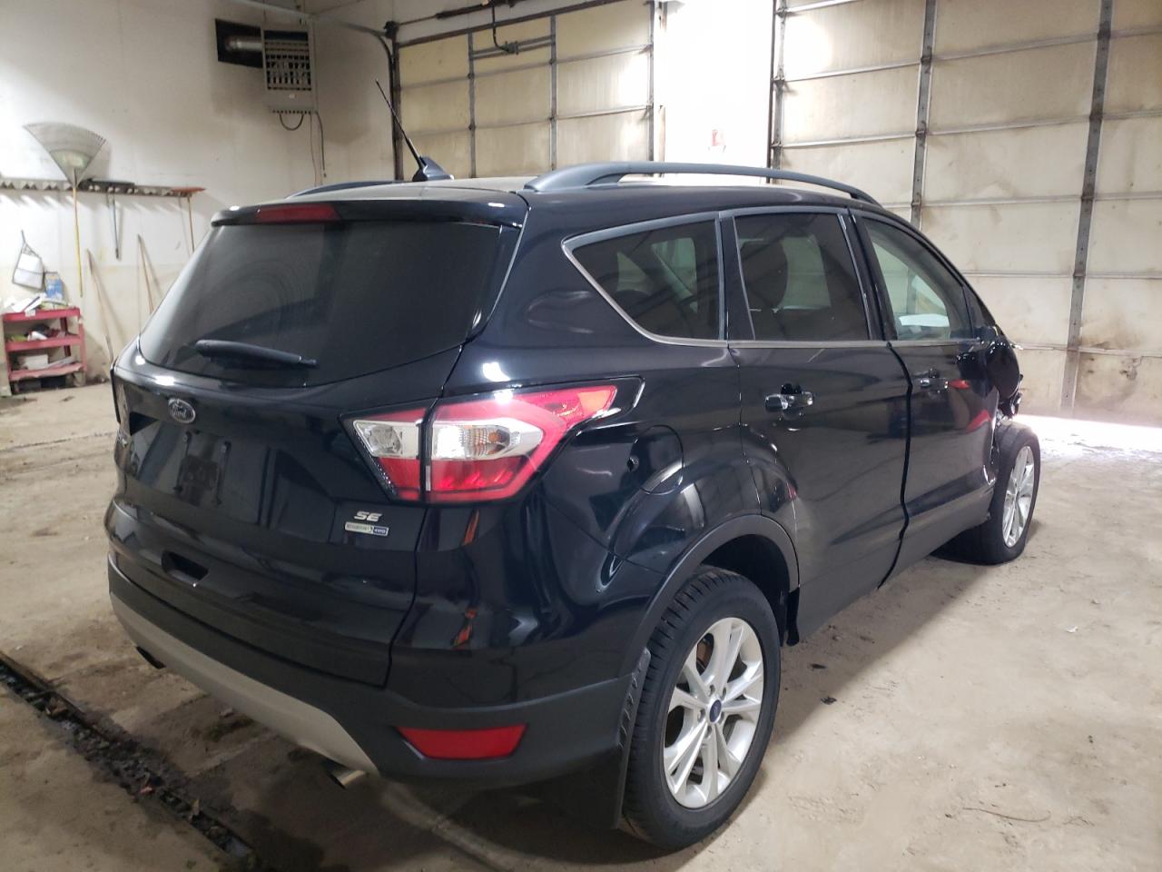 Photo 4 from auction – 2018 FORD ESCAPE SE with VIN 1FMCU9GD0JUC69118