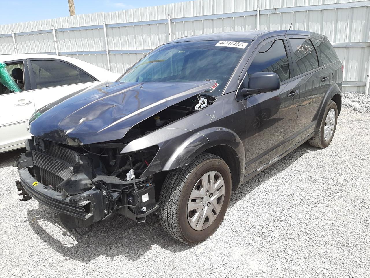 Photo 2 from auction – 2014 DODGE JOURNEY SE with VIN 3C4PDCABXET263157