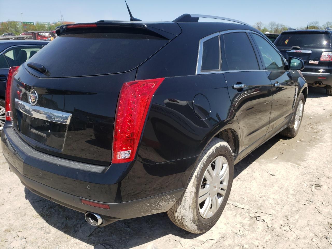 Photo 4 from auction – 2011 CADILLAC SRX LUXURY with VIN 3GYFNAEY8BS649017