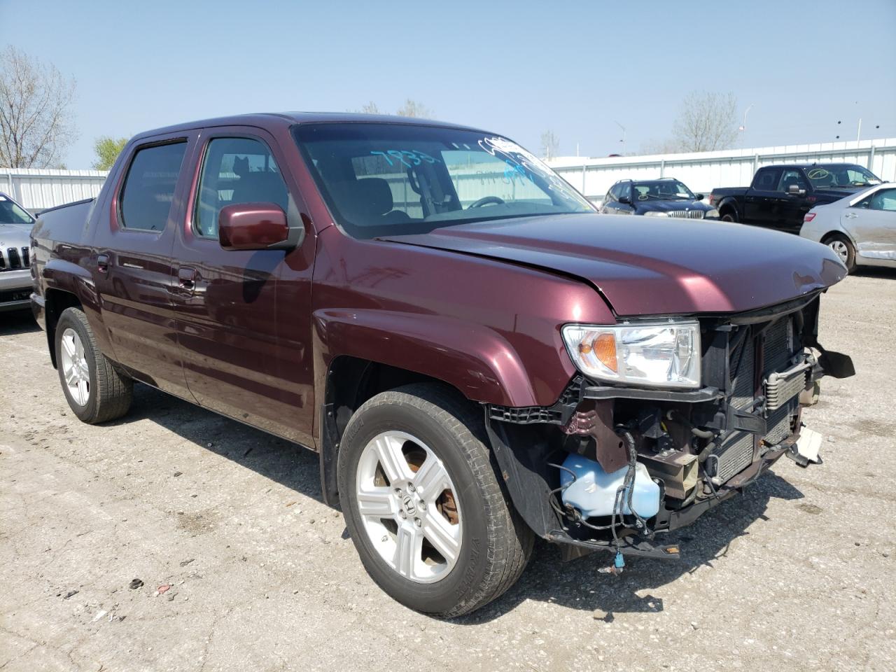 HONDA RIDGELINE 2012 with VIN 5FPYK1F54CB457932 - Photo from auction