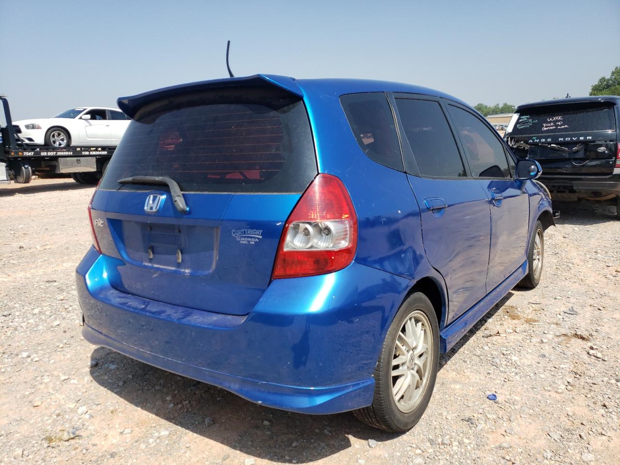 Photo 4 from auction – 2007 HONDA FIT S with VIN JHMGD38677S004671