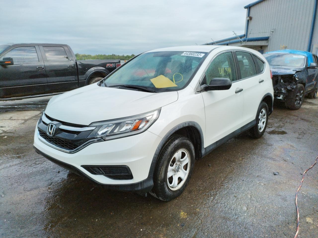 Photo 15 from auction – 2016 HONDA CR-V LX with VIN 5J6RM3H35GL017004