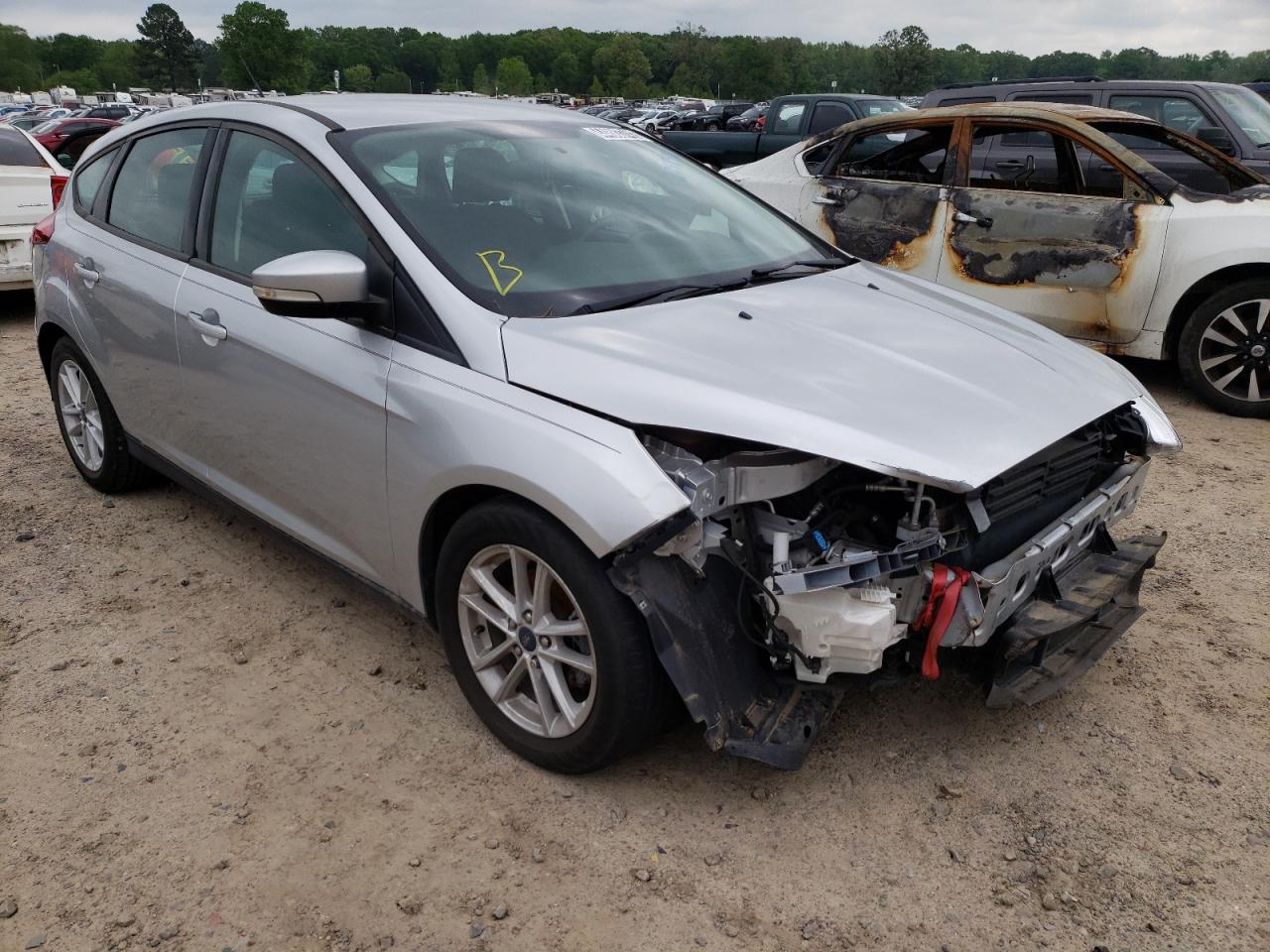 FORD FOCUS SE 2017 with VIN 1FADP3K29HL274892 - Photo from auction