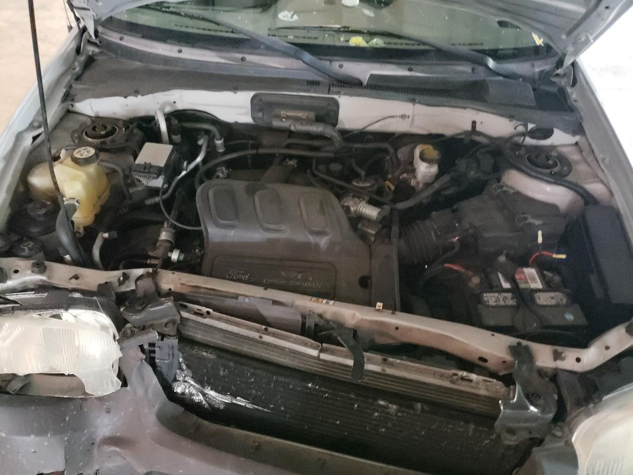 Photo 7 from auction – 2002 FORD ESCAPE XLT with VIN 1FMCU04142KB43847
